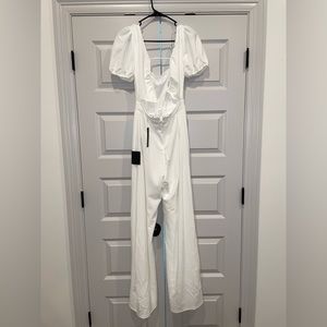 Lulu’s white jumpsuit. Crepe material. Ties in the back. Size S.